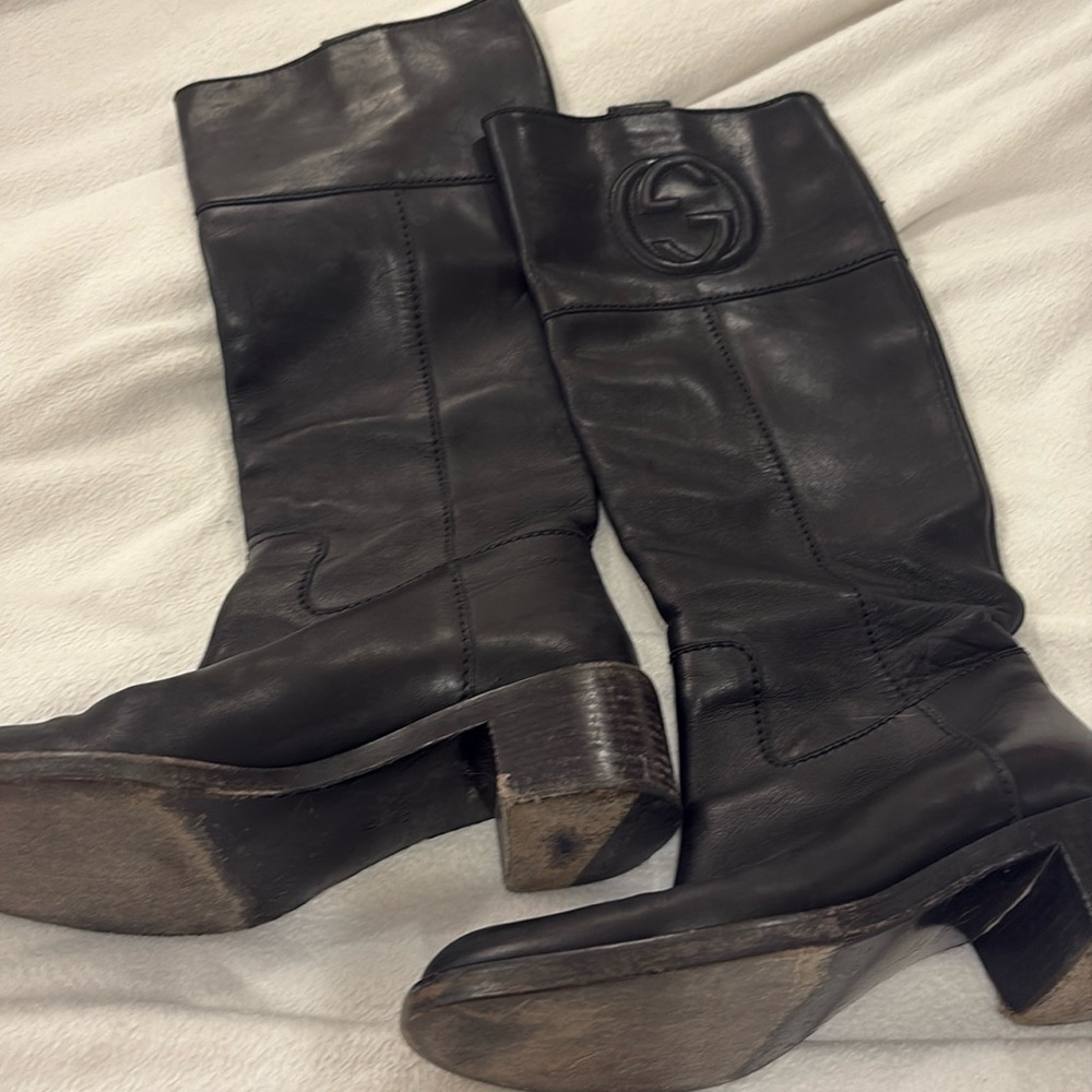 Knee high Gucci boots worn but so gorgeous.  Stunning gg stitching